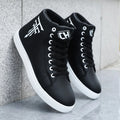 High Top Sneakers – Stylish casual skate shoes on a textured surface.