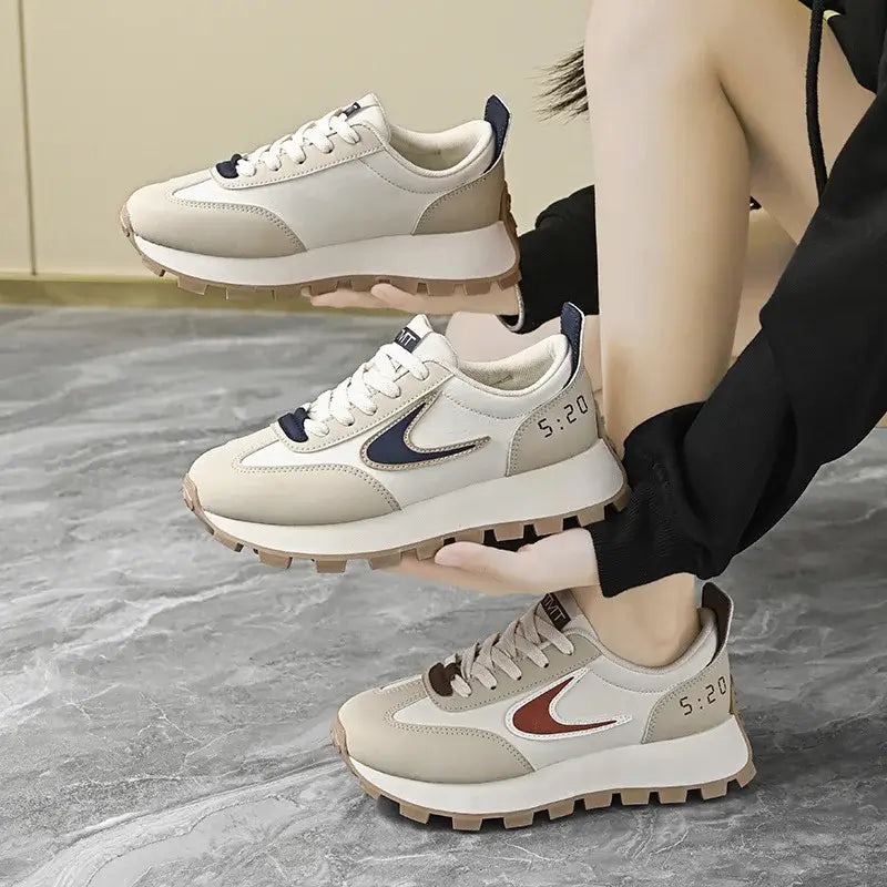 Women Breathable Casual Sneakers worn with a black hoodie, showcasing light comfort shoes in a stylish setting.