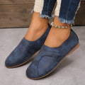 Women Retro Leather Sneakers in blue, stylish slip-on casual shoes with comfortable design and textured finish.