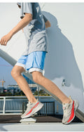  Lightweight Running Sneakers being worn by a person on a bridge, showcasing breathable and non-slip features.