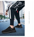Men's Lightweight Running Sneakers showcased with casual athletic wear in an urban setting.