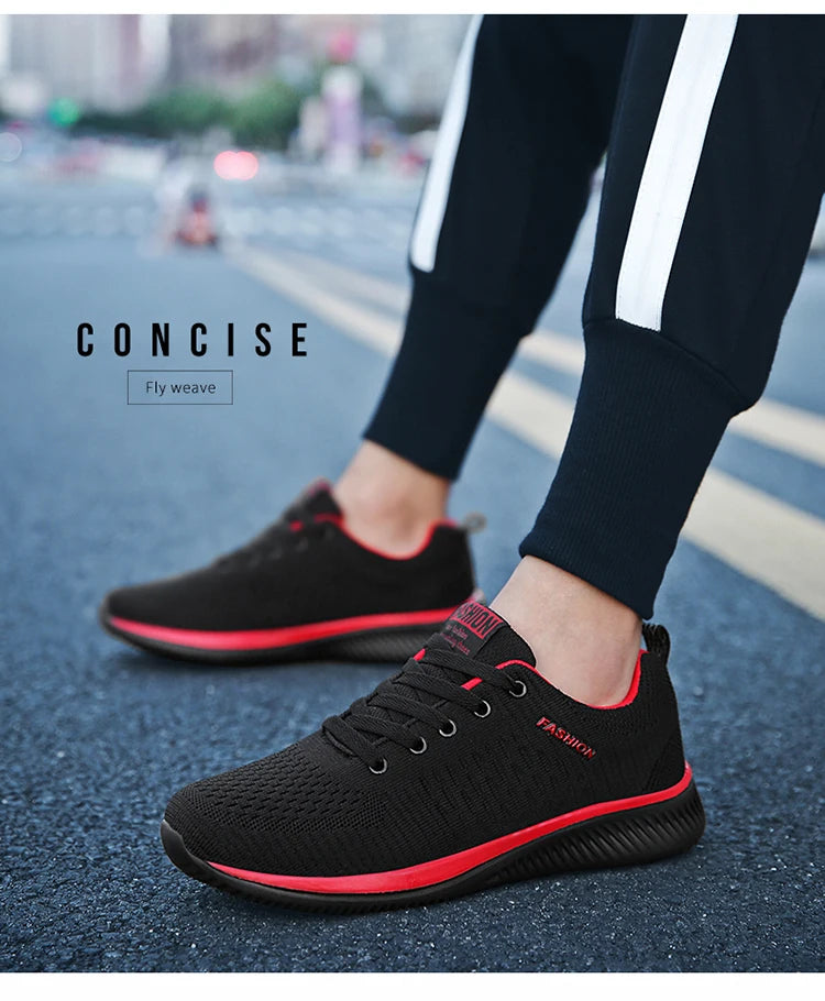 Men's Lightweight Running Sneakers in black being laced up, perfect for casual and sporty looks.