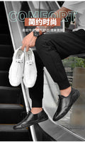 Men’s Casual Leather Sneakers – Comfortable Walking Shoes in a hand-held view showcasing black leather design