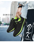Men's Lightweight Running Sneakers in black being laced up, perfect for casual and sporty looks.