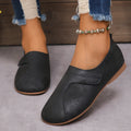 Women Retro Leather Sneakers in blue, stylish slip-on casual shoes with comfortable design and textured finish.