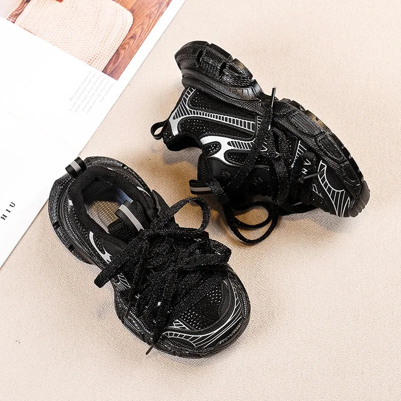 Girls Casual Sneakers in silver with lace-up design and soft comfortable bowtie style.