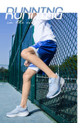  Lightweight Running Sneakers being worn by a person on a bridge, showcasing breathable and non-slip features.