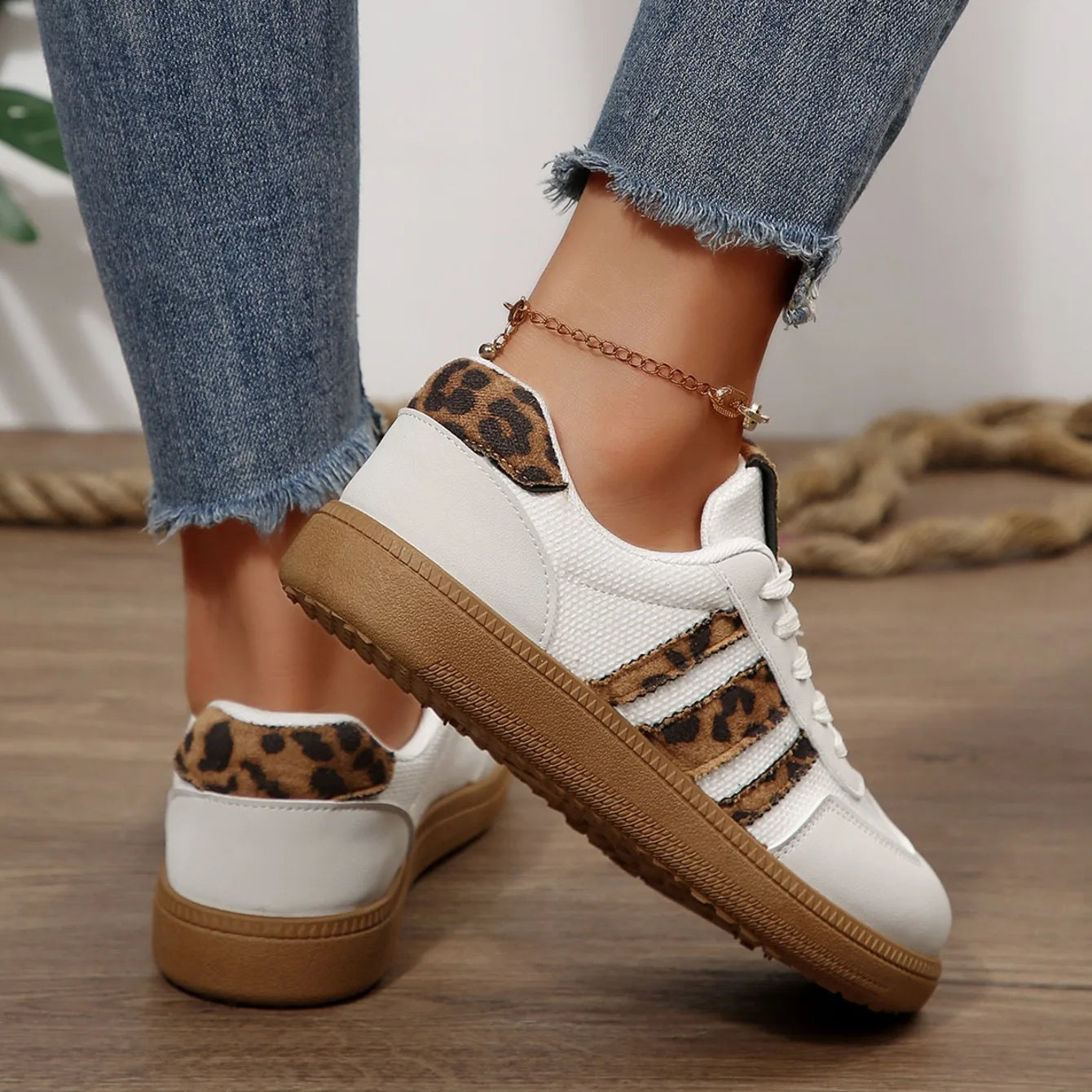  Women Luxury Designer Sneakers 2025 with leopard print accents and slip-on style for casual comfort.