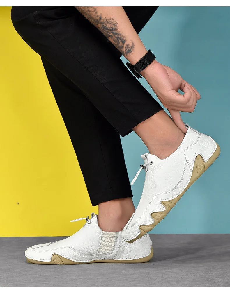 Men’s Casual Leather Sneakers – Comfortable Walking Shoes in a hand-held view showcasing black leather design