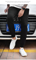Men’s Casual Leather Sneakers – Comfortable Walking Shoes in a hand-held view showcasing black leather design