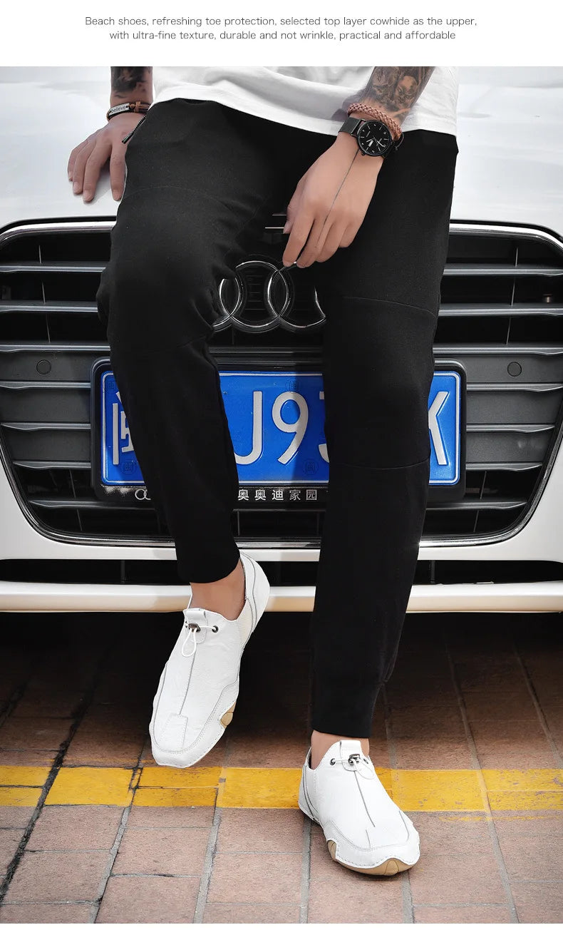 Men’s Casual Leather Sneakers – Comfortable Walking Shoes in a hand-held view showcasing black leather design