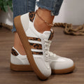  Women Luxury Designer Sneakers 2025 with leopard print accents and slip-on style for casual comfort.