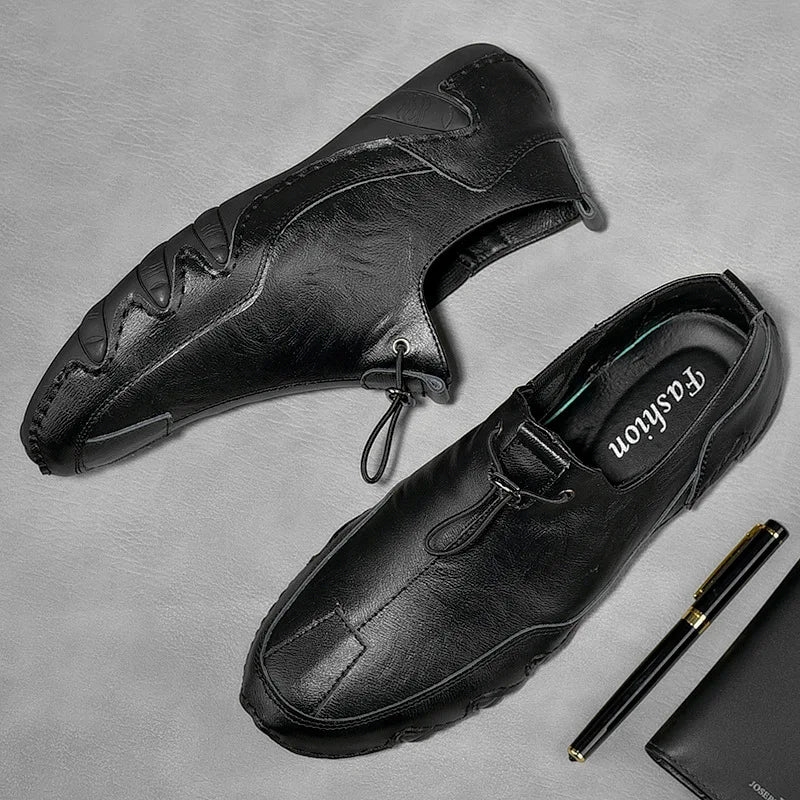 Men’s Casual Leather Sneakers – Comfortable Walking Shoes in a hand-held view showcasing black leather design