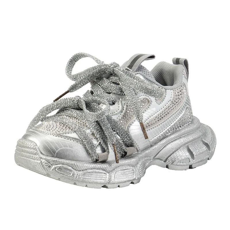 Girls Casual Sneakers in silver with lace-up design and soft comfortable bowtie style.