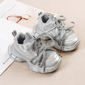Girls Casual Sneakers in silver with lace-up design and soft comfortable bowtie style.