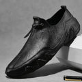 Men’s Casual Leather Sneakers – Comfortable Walking Shoes in a hand-held view showcasing black leather design