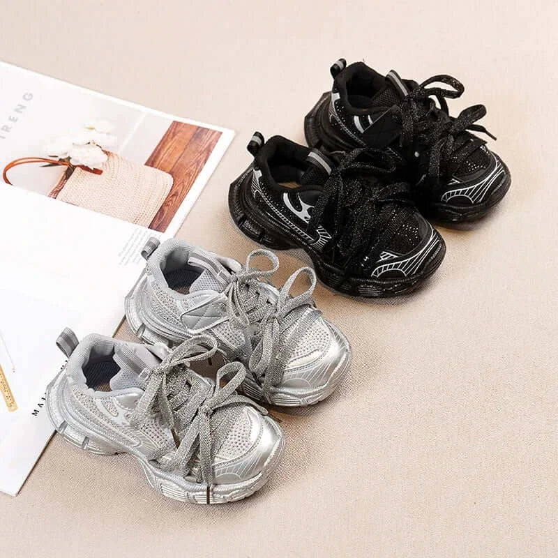 Girls Casual Sneakers in silver with lace-up design and soft comfortable bowtie style.