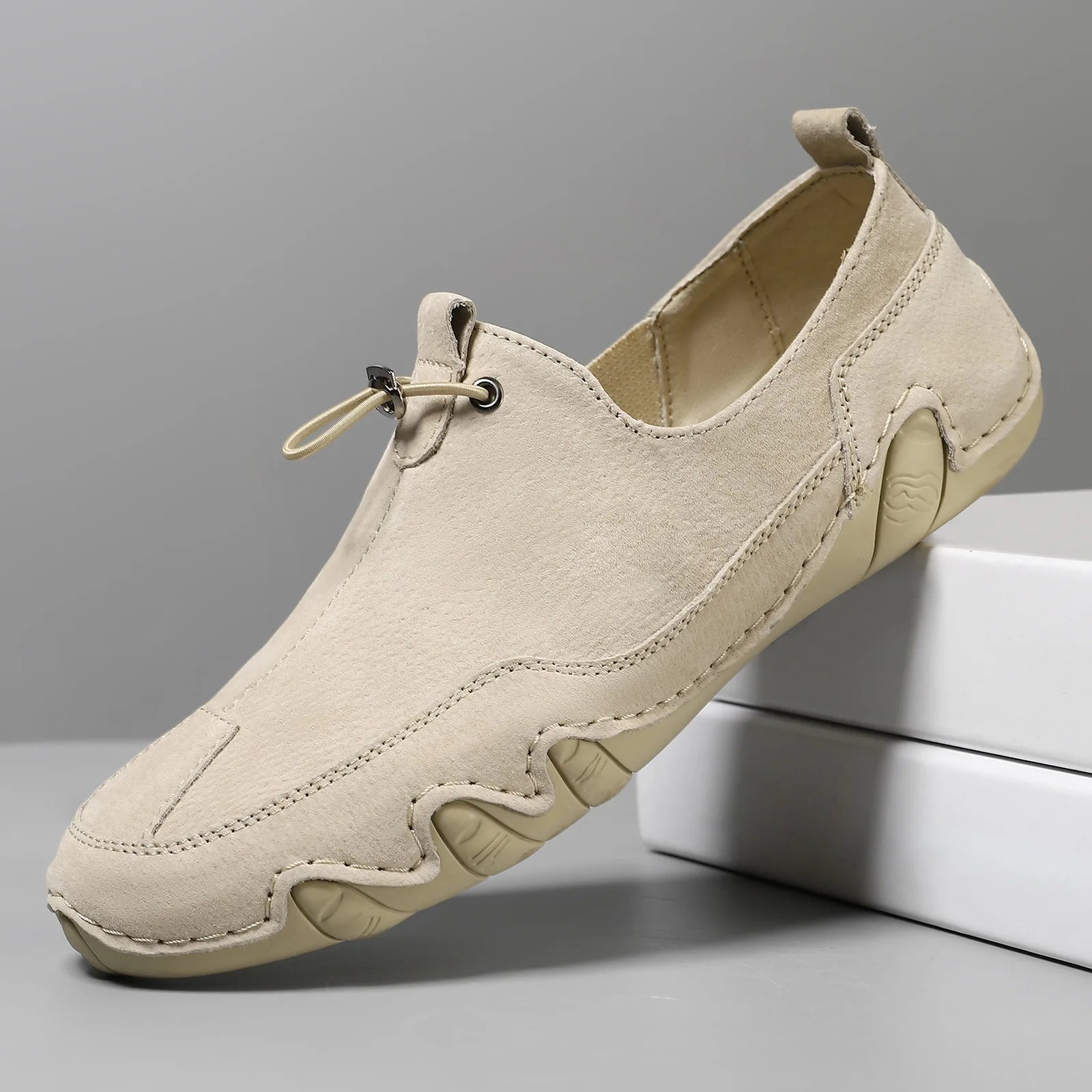 Men’s Casual Leather Sneakers – Comfortable Walking Shoes in a hand-held view showcasing black leather design