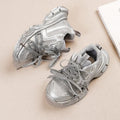 Girls Casual Sneakers in silver with lace-up design and soft comfortable bowtie style.