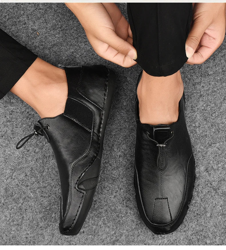 Men’s Casual Leather Sneakers – Comfortable Walking Shoes in a hand-held view showcasing black leather design