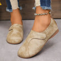 Women Retro Leather Sneakers in blue, stylish slip-on casual shoes with comfortable design and textured finish.