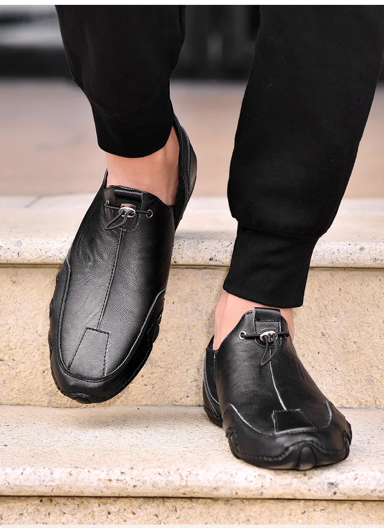Men’s Casual Leather Sneakers – Comfortable Walking Shoes in a hand-held view showcasing black leather design