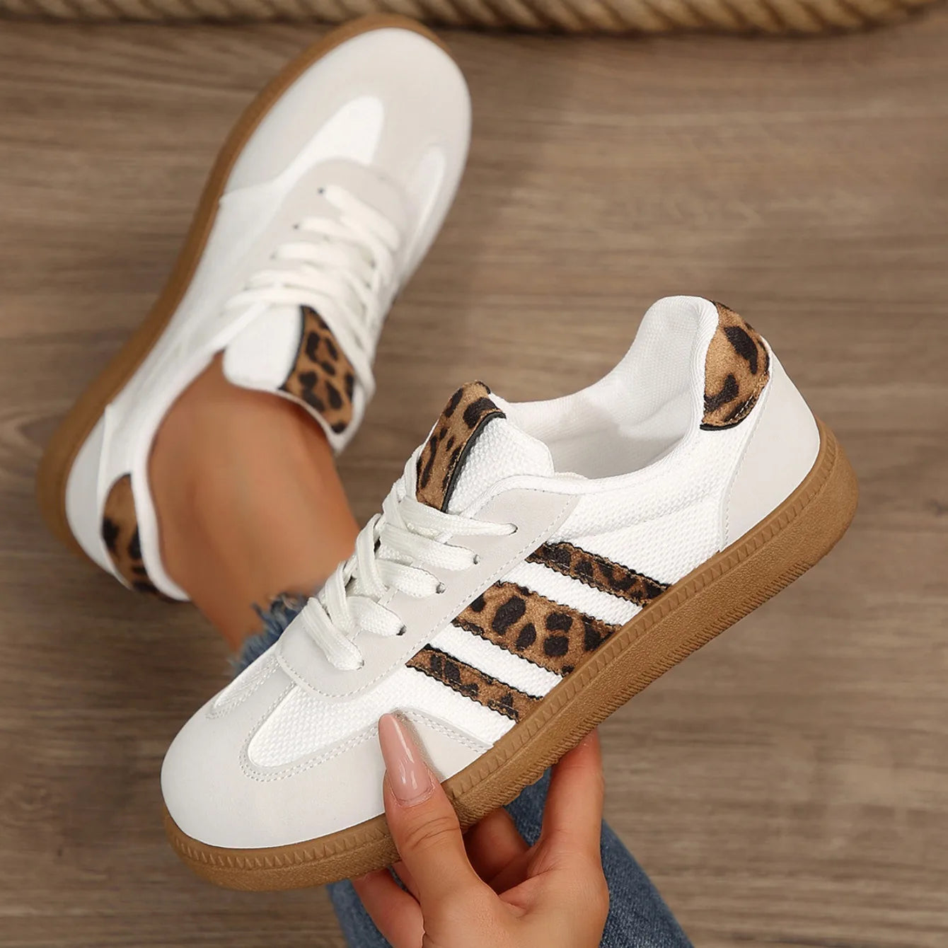  Women Luxury Designer Sneakers 2025 with leopard print accents and slip-on style for casual comfort.