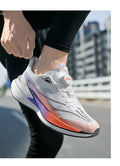  Lightweight Running Sneakers being worn by a person on a bridge, showcasing breathable and non-slip features.