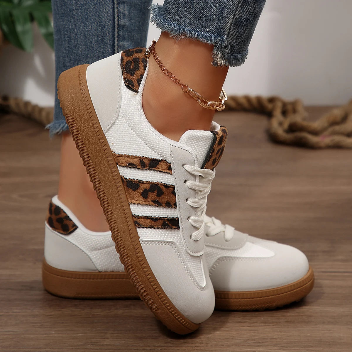  Women Luxury Designer Sneakers 2025 with leopard print accents and slip-on style for casual comfort.