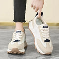  Women Breathable Casual Sneakers worn with a black hoodie, showcasing light comfort shoes in a stylish setting.