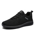 Men's Lightweight Running Sneakers in black being laced up, perfect for casual and sporty looks.