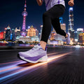  Lightweight Running Sneakers being worn by a person on a bridge, showcasing breathable and non-slip features.
