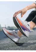  Lightweight Running Sneakers being worn by a person on a bridge, showcasing breathable and non-slip features.