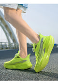  Lightweight Running Sneakers being worn by a person on a bridge, showcasing breathable and non-slip features.