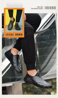 Men’s Casual Leather Sneakers – Comfortable Walking Shoes in a hand-held view showcasing black leather design