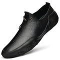 Men’s Casual Leather Sneakers – Comfortable Walking Shoes in a hand-held view showcasing black leather design