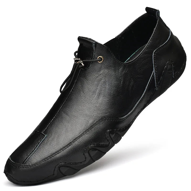 Men’s Casual Leather Sneakers – Comfortable Walking Shoes in a hand-held view showcasing black leather design