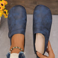 Women Retro Leather Sneakers in blue, stylish slip-on casual shoes with comfortable design and textured finish.