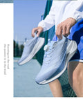  Lightweight Running Sneakers being worn by a person on a bridge, showcasing breathable and non-slip features.