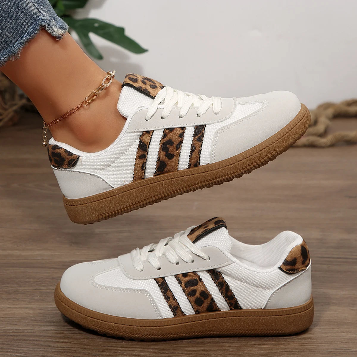  Women Luxury Designer Sneakers 2025 with leopard print accents and slip-on style for casual comfort.